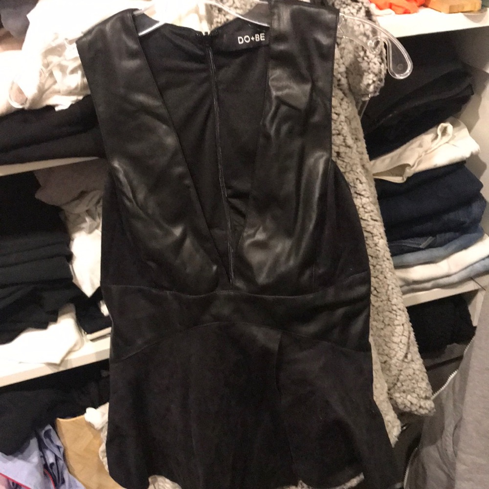 Faux leather sleeveless peplum woman’s top